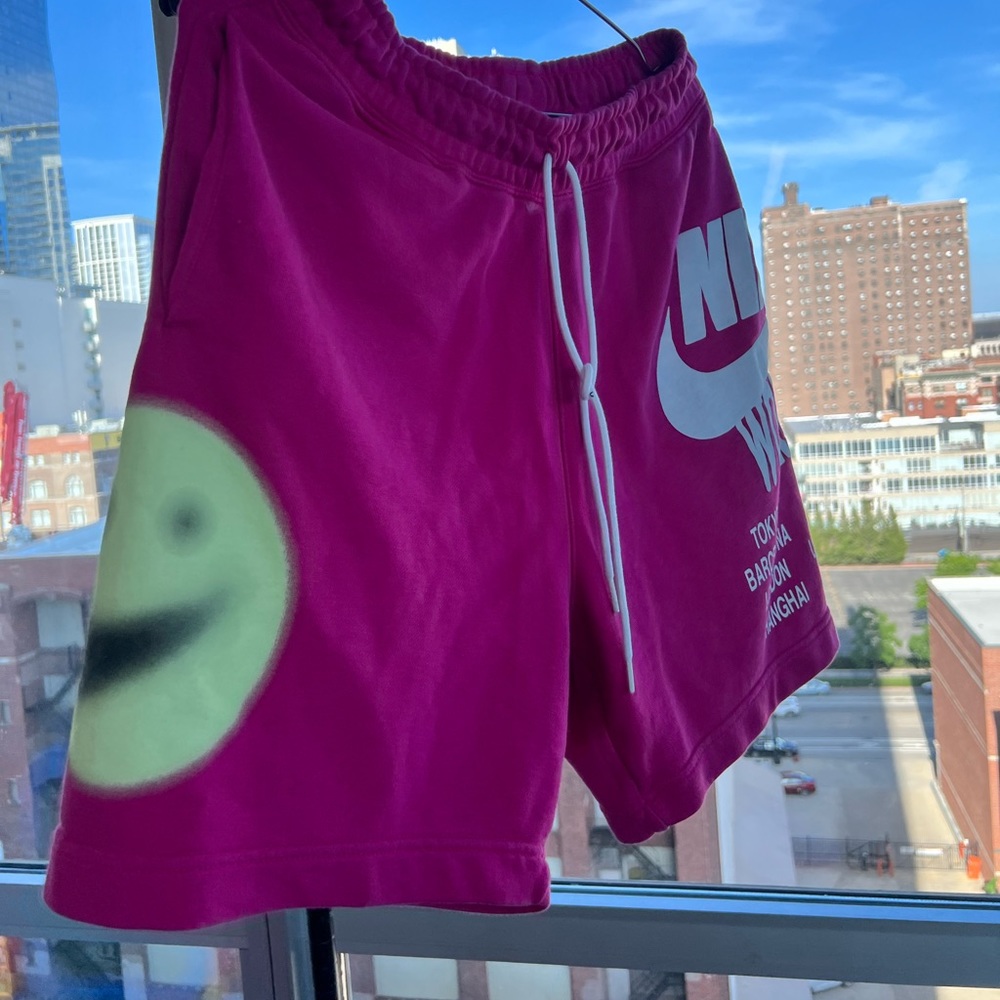 Nike pink shorts with smiley face